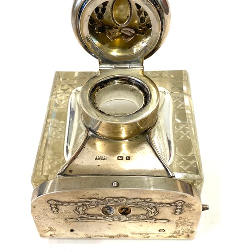 589 - Silver inkwell calander, calander in working order, missing calender button, approximate height 10cm... 