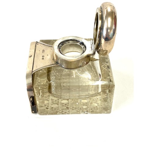 589 - Silver inkwell calander, calander in working order, missing calender button, approximate height 10cm... 