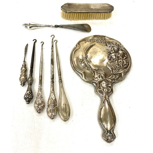 590 - Selection of silver dressing table mirrors, button hooks etc