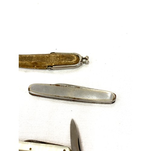 542 - Selection of 4 vintage pen knifes, to include a silver piece