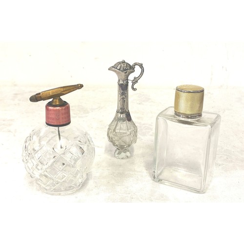 554 - Selection vintage perfume bottles, 2 are silver topped