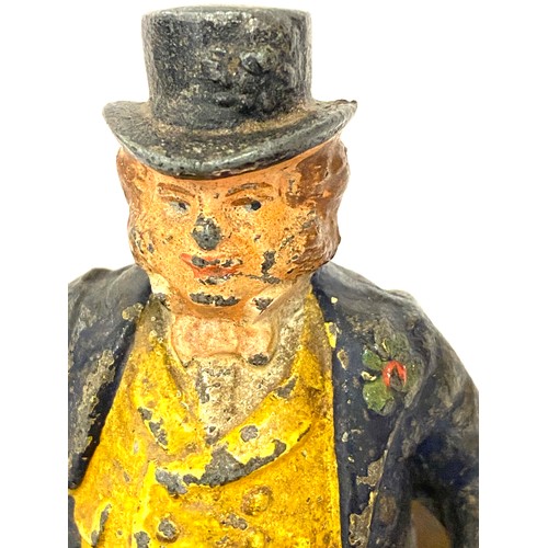 550 - Cold painted John Bull figure, approximate height: 4 inches