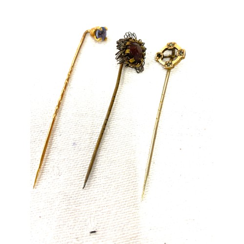 562 - 3 Vintage stone set hat pins