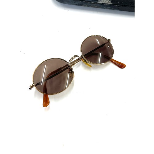 537 - Emporio Armani vintage sunglasses, a pair of DKNY vintage sunglasses and a pair of Ralph Lauren glas... 