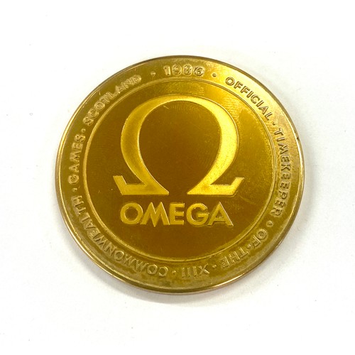 552 - Omega medal 1986 XIII Scottish commonwealth games presentation medal