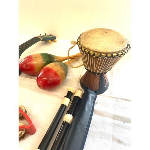 37 - Selection of assorted musical instruments to include flutes tambourine etc