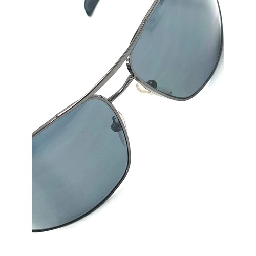 510 - Pair authentic Mens Prada sunglasses