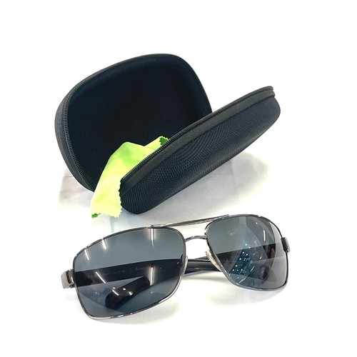 510 - Pair authentic Mens Prada sunglasses