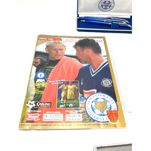 131 - LCFC memorabilia to include pen set, programme and photo