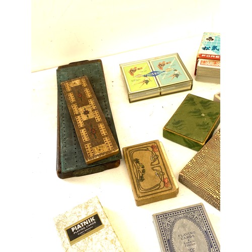 143 - Selection of vintage playing cards, Cribbage boards etc