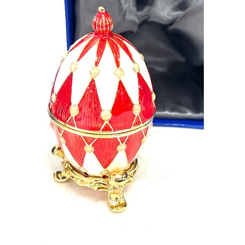 73 - 2 boxed small faberge eggs on stands, only one with paperwork