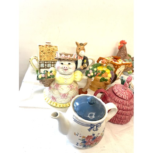 280 - Selection of 10 novelty teapots