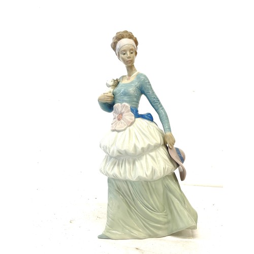 82 - Vintage Nao lady and dog ornament, approximate height: 13.5 inches, overall good condition