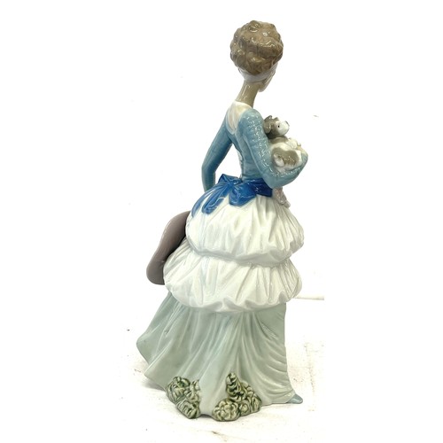 82 - Vintage Nao lady and dog ornament, approximate height: 13.5 inches, overall good condition