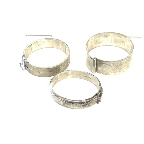 514A - 3 Silver hallmarked silver bangles, approximate total weight 90g