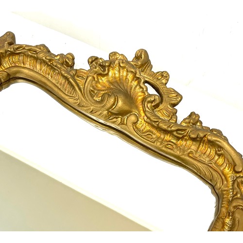 77 - Gilt framed mirror, approximate measurements: 22 x 15 inches