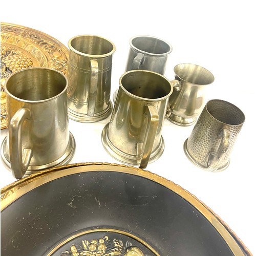 340 - Selection of assorted brassware and metalware to include Tankards, chargers etc