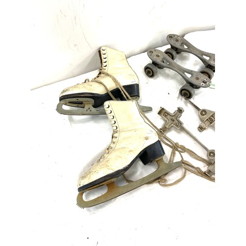 167 - Pair vintage roller skates, ice skates and spare blades