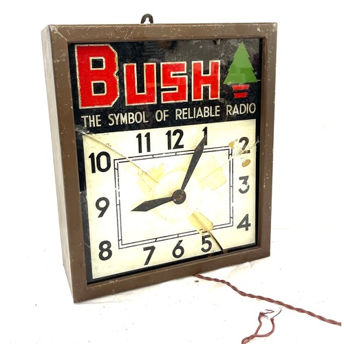 87 - Bush The symbol of reliable radio advertising clock, glass has been damage, overall measurements: He... 