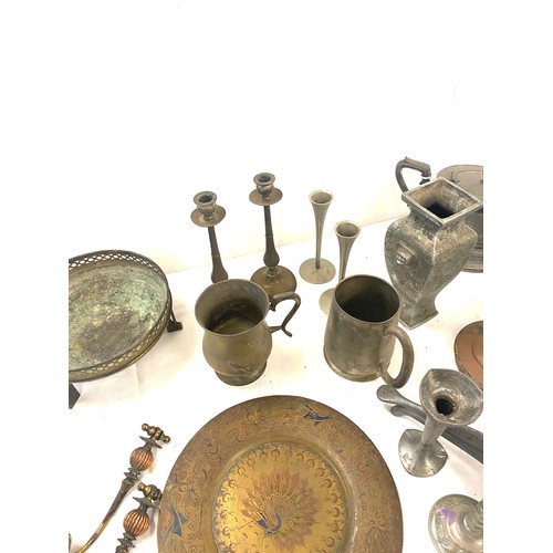 219 - Selection of metalware to include candle sticks etc