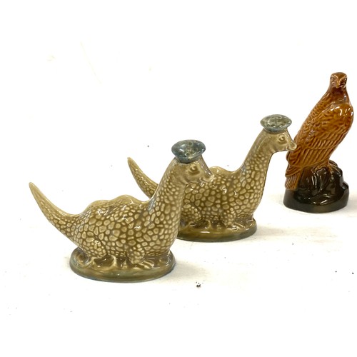 48 - Selection of miniatures to include Beswick and Wade,  Loch Ness, Eagle, bear and Seal all with conte... 