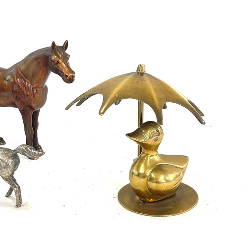 57 - Selection of metal animal ornaments to include dogs, horse etc