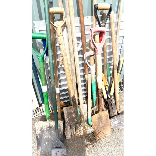 100D - Large selection of garden tools to include rakes, forks, spades etc