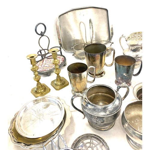 300 - Large selection of silver plated items to include candle sticks, toast rack etc