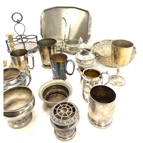 300 - Large selection of silver plated items to include candle sticks, toast rack etc