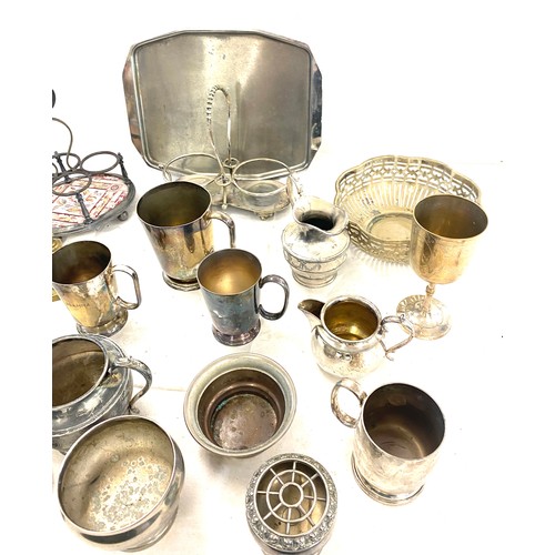 300 - Large selection of silver plated items to include candle sticks, toast rack etc