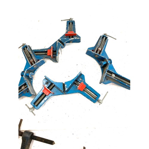 372 - selection of corner clamps, one g clamp and two compresssion clamps.