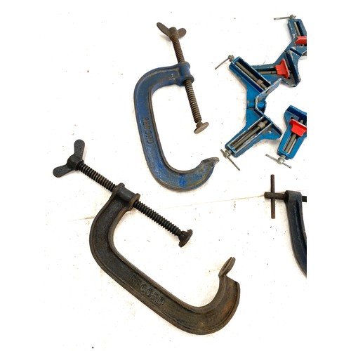 372 - selection of corner clamps, one g clamp and two compresssion clamps.