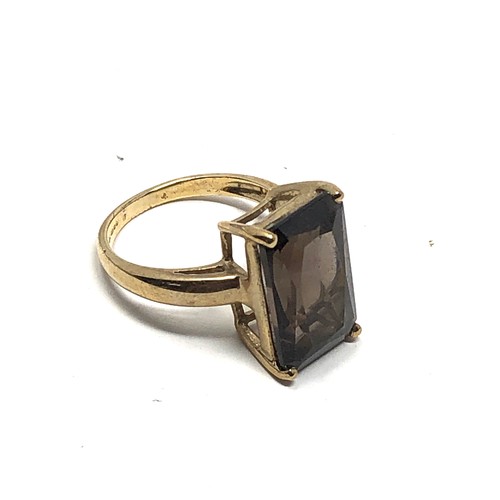 234 - 9ct gold smoky quartz ring (4.9g)