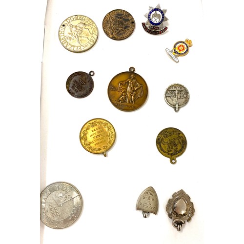 545 - Selection of vintage and later fobs/ medals includes silver fob, the infants hospital medal etc