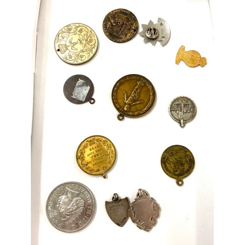 545 - Selection of vintage and later fobs/ medals includes silver fob, the infants hospital medal etc