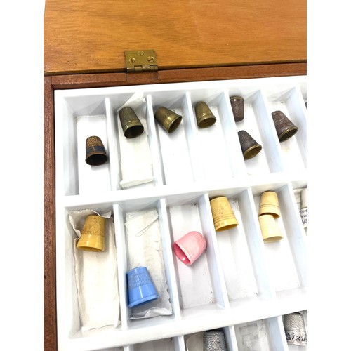 334 - Box of assorted thimbles includes glass thimbles, cloisonne thimbles etc