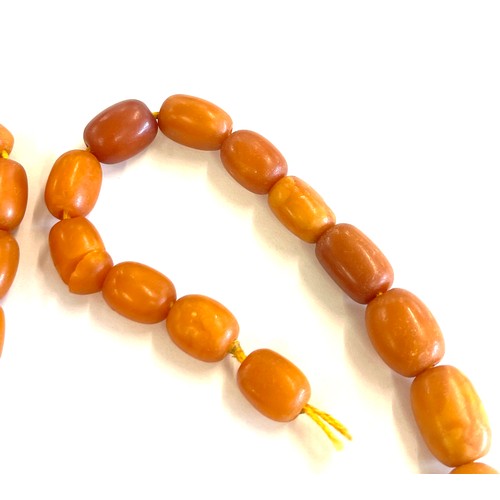 503 - Antique egg yolk amber bead necklace for re stringing total weight approx 42 grams, length 53cm