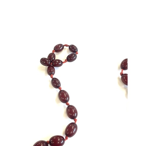 504 - Art deco cherry red amber bakelite bead necklace total weight 52 grams, no internal streaking length... 