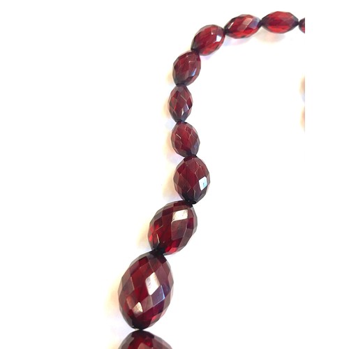 506 - Vintage faceted amber bead bakelite necklace weight approx 38grams length approx 38cm