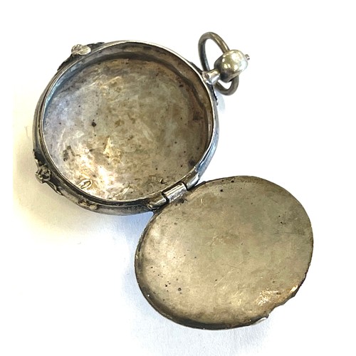 500 - Early religious antique white metal locket