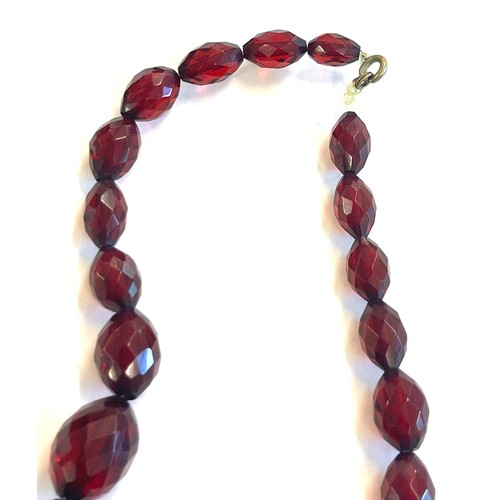 506 - Vintage faceted amber bead bakelite necklace weight approx 38grams length approx 38cm