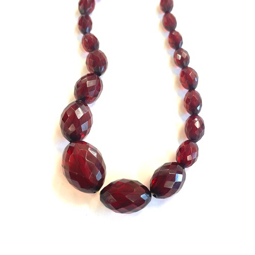 506 - Vintage faceted amber bead bakelite necklace weight approx 38grams length approx 38cm