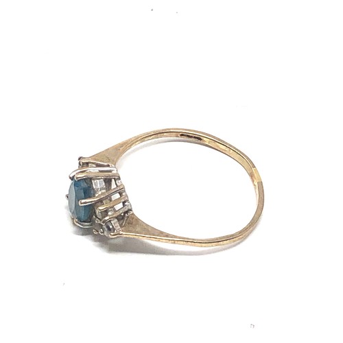 148 - 9ct gold blue topaz & clear stone ring (1.7g)