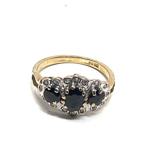 154 - 9ct gold sapphire & diamond ring (2g)