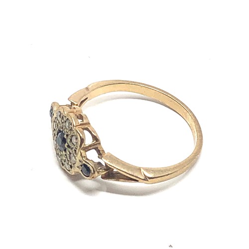132 - 9ct gold sapphire & diamond halo ring (1.7g)