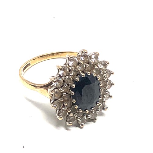 121 - 9ct gold sapphire & clear stone  ring (5.7g)