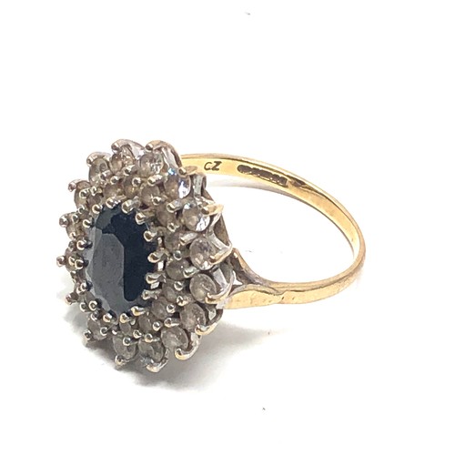 121 - 9ct gold sapphire & clear stone  ring (5.7g)