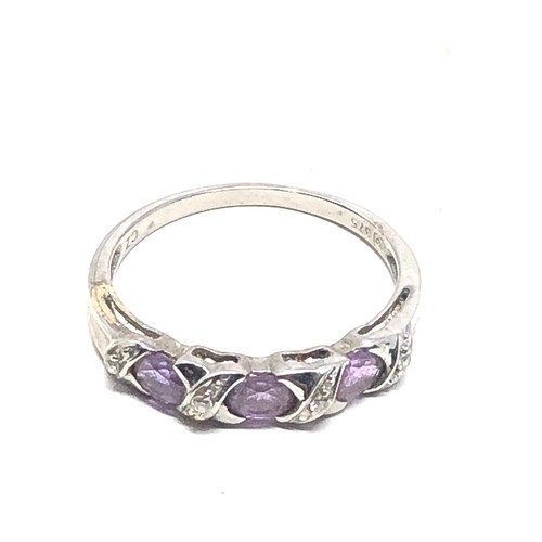 176 - 9ct gold amethyst & clear stone ring (1.7g)