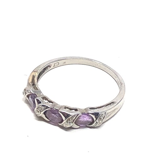 176 - 9ct gold amethyst & clear stone ring (1.7g)