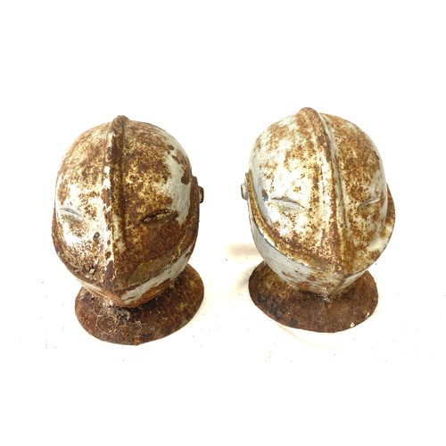 155 - 2 Heavy cast iron knight heads, 4 inches tall